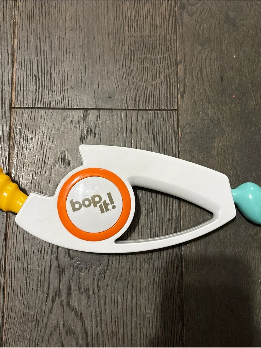 Hasbro Bop It! Handheld Game Toy in White, Orange, Yellow, Teal